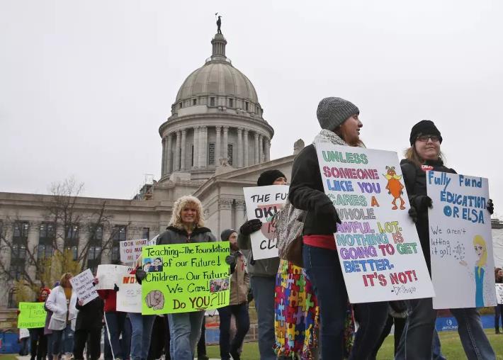 image of teachers picketing in Oklahoma capital